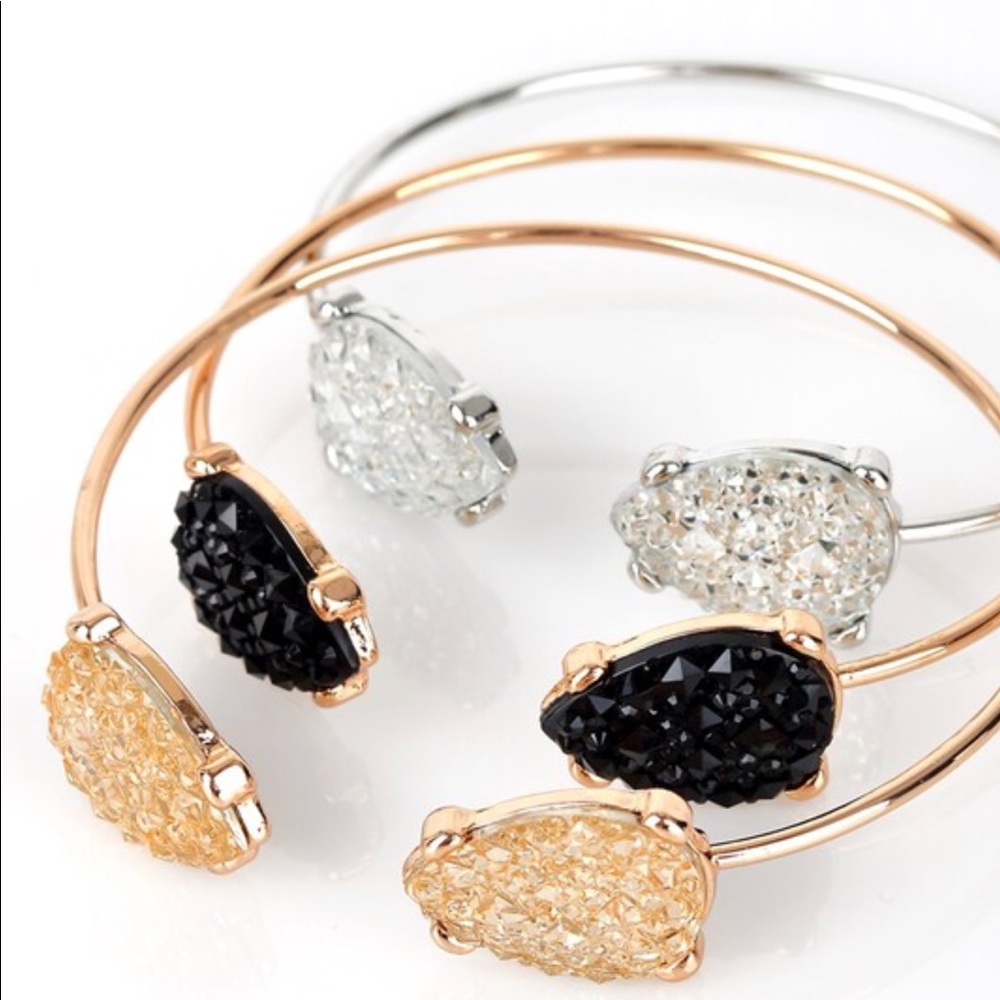 Gold tear drop bangle